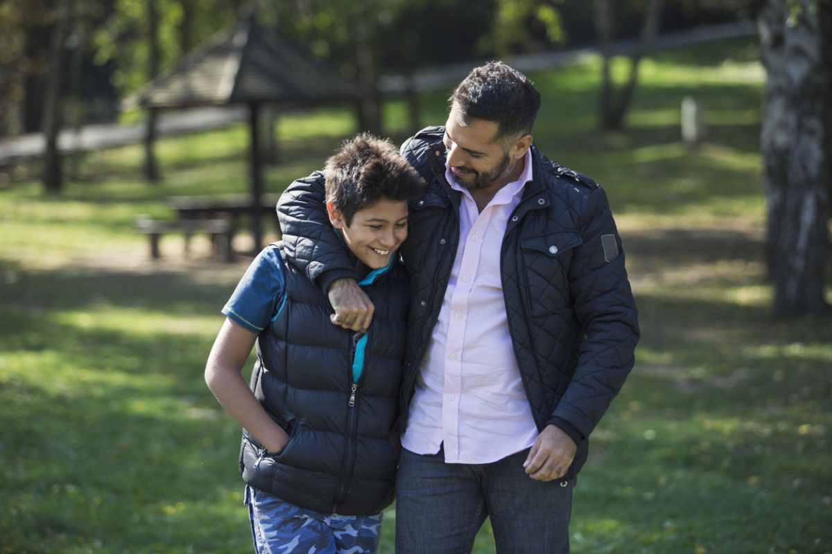 Child walking with father